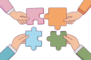 Vier handen schuiven puzzelstukjes in elkaar